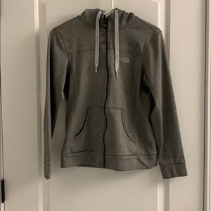 Gray women’s The North Face zip up jacket
